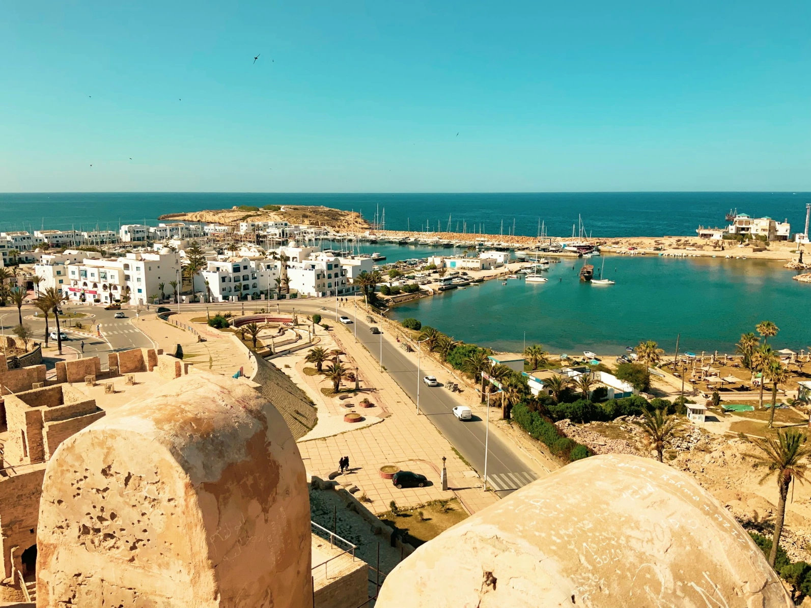 A harbor in Tunisia an aerial view of a harbor with boats in the water