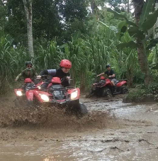 Tourists doing quad biking in Jinja