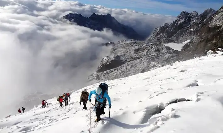 Successful climbers on the snow capped Rwenzori Peaks